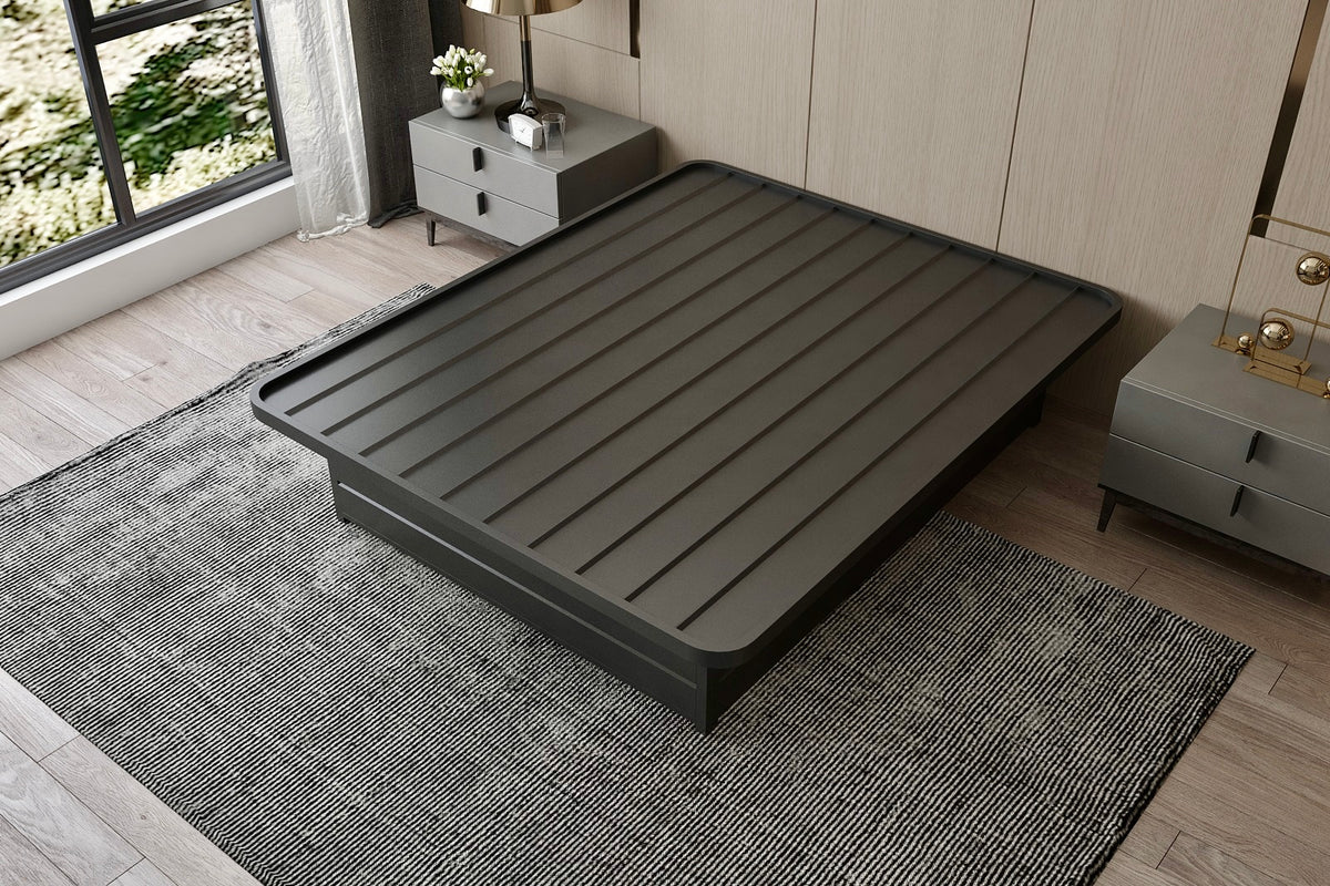 Big Ben sheet-top hospitality bed base in a room